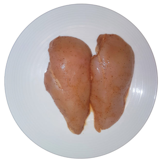 Season chicken breast