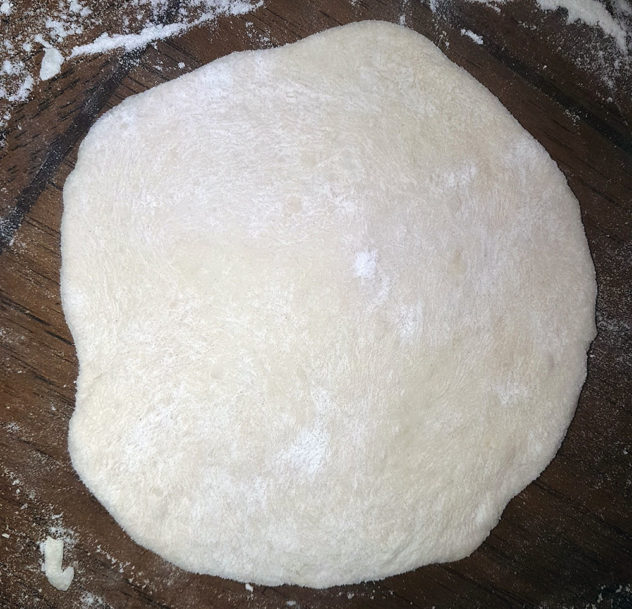 Roll dough out into a thin disc