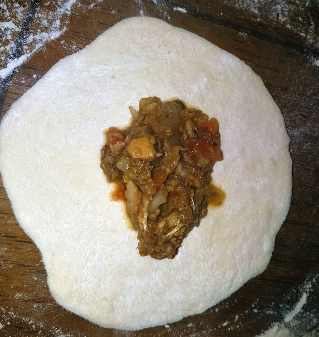 Put filling on circle shaped dough